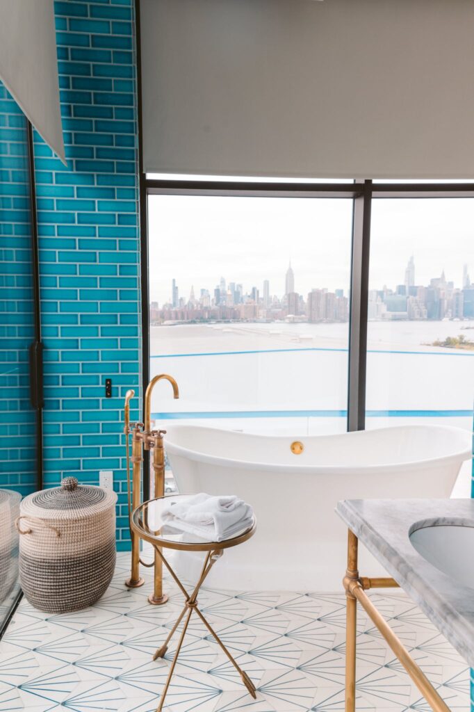 A Bathtub with a View of the City Skyline